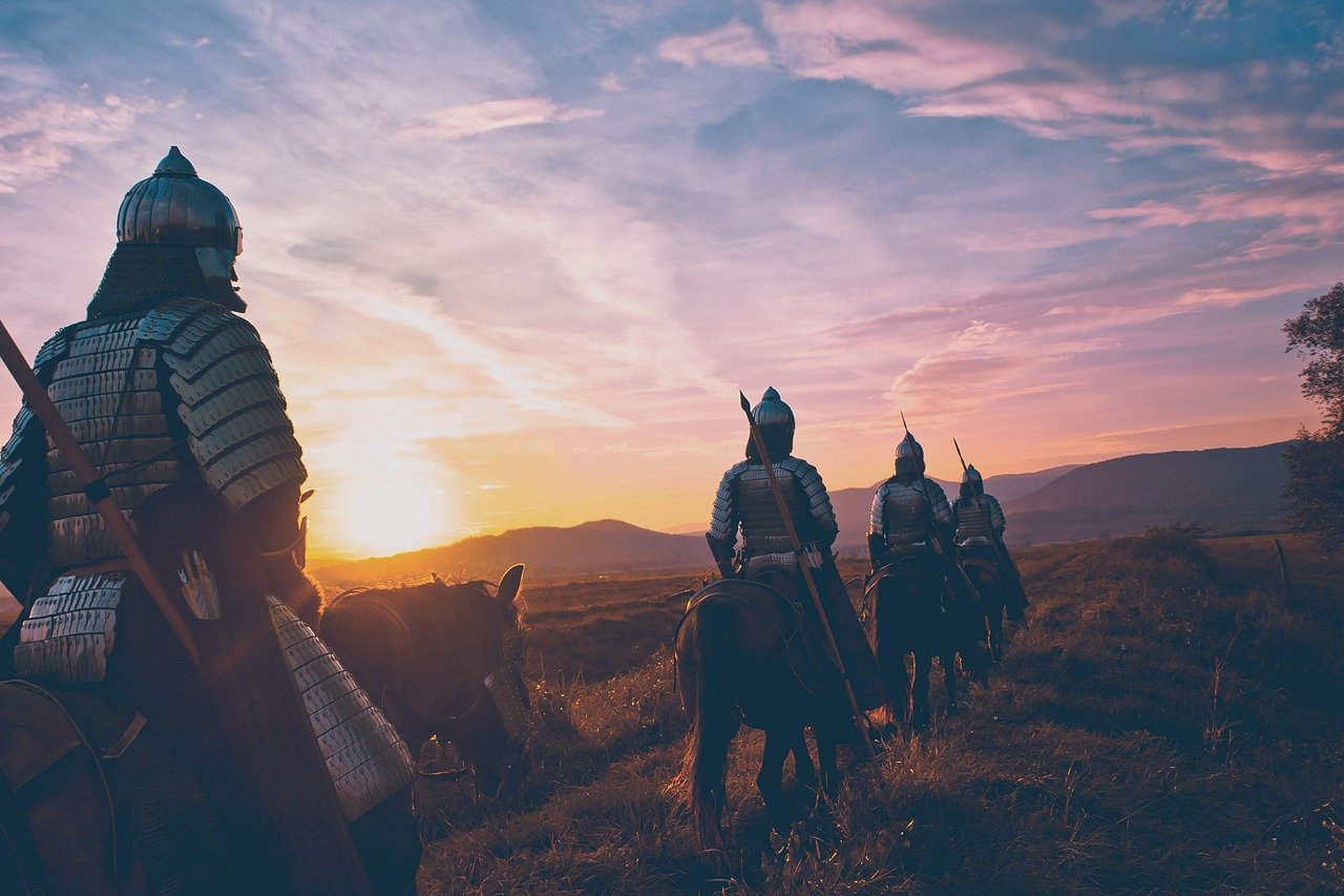 Cette image décrit un bataillon de chevalier japonais en armure qui se dirige vers le soleil couchant, l'image a une connotation poétique car le soleil irise le ciel d'un couleur orange à rose-violet